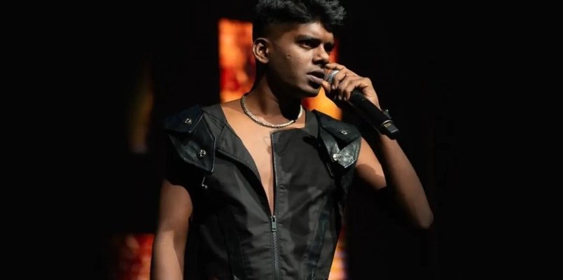 Rapper Vedan leading Azadi Yatra protest in Kochi with the Indian Constitution.